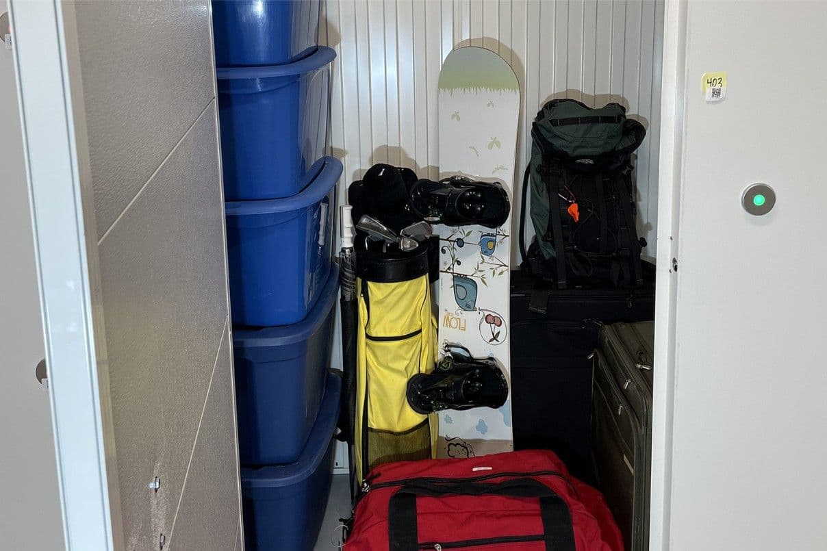 A small CityBox Midtown unit holding bins, luggage and sports gear