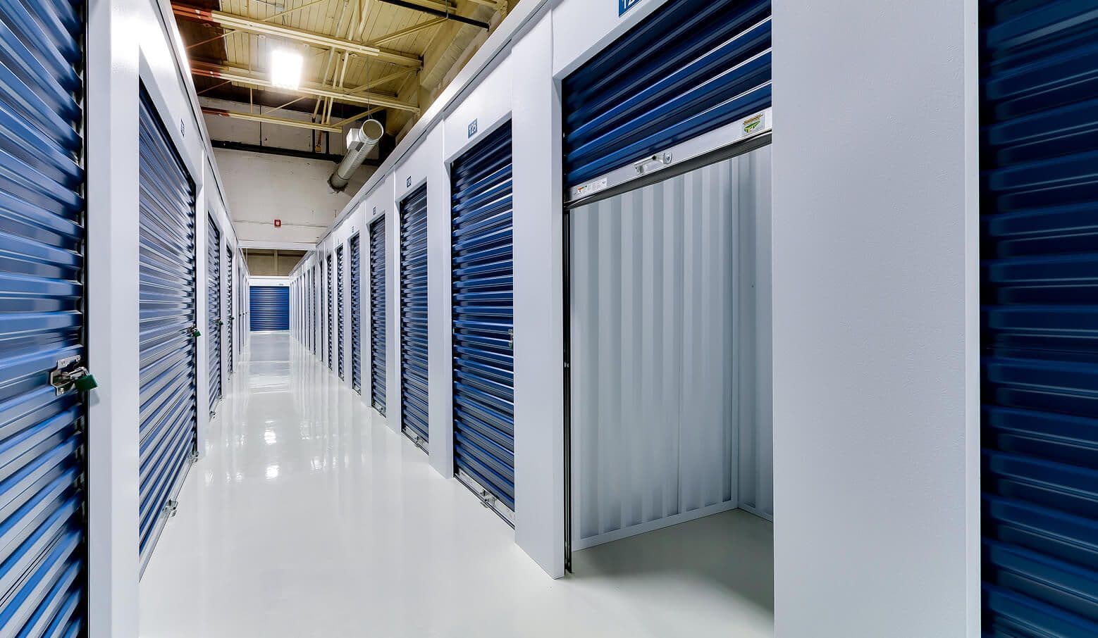 Bright hallway of blue storage units at CityBox Manchester